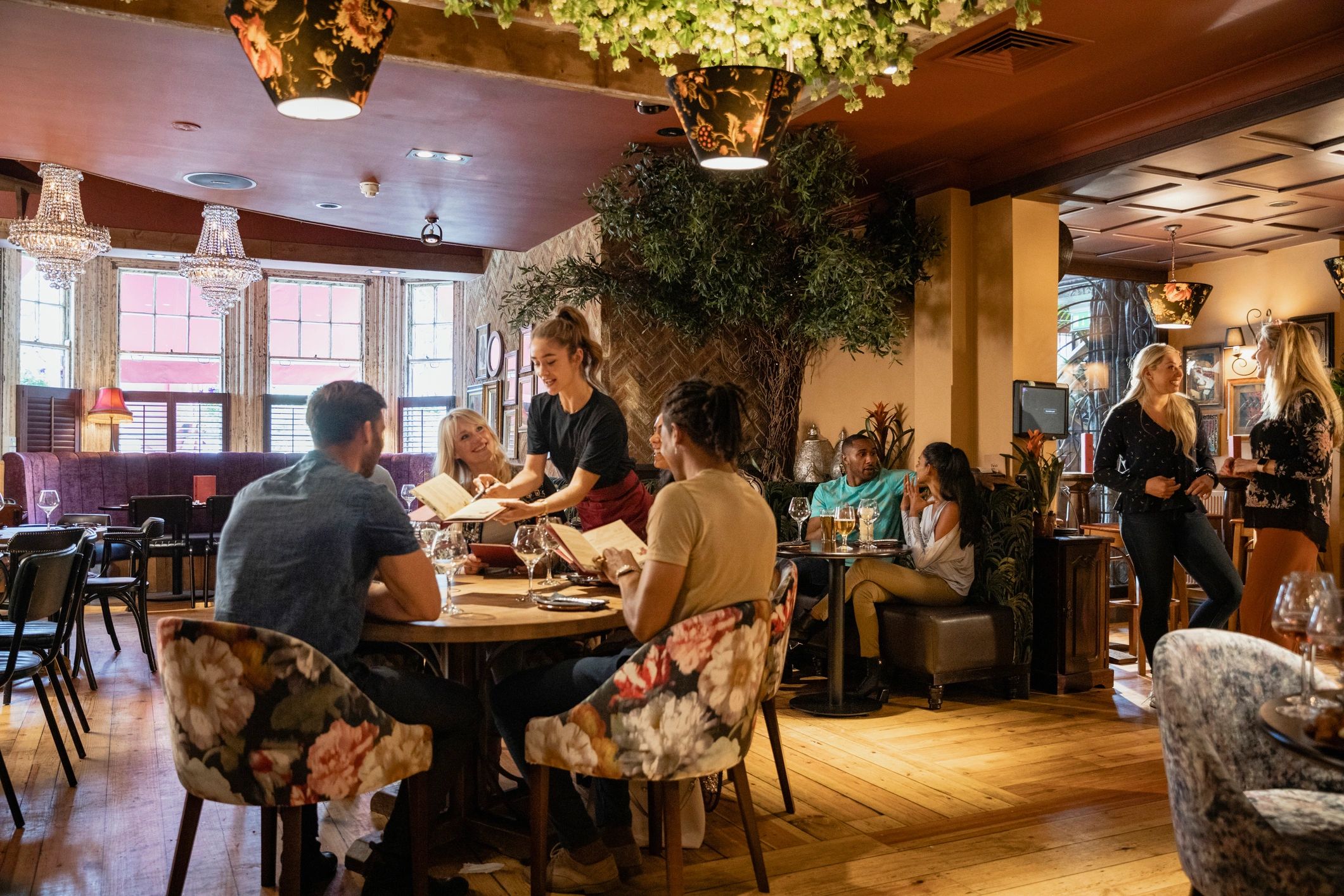Restaurant dining room with guests enjoying their meal