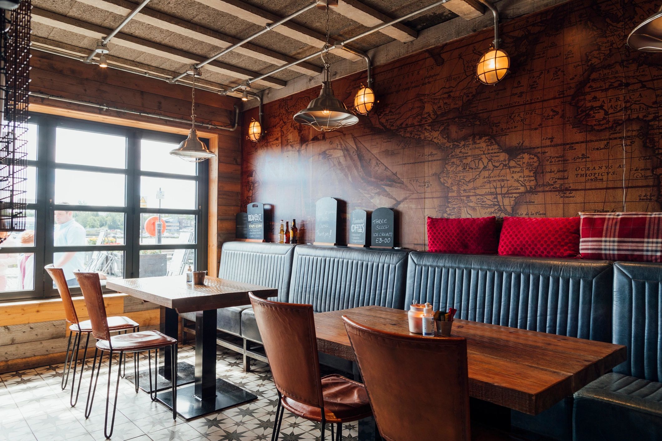 Restaurant interior with seating and warm lighting