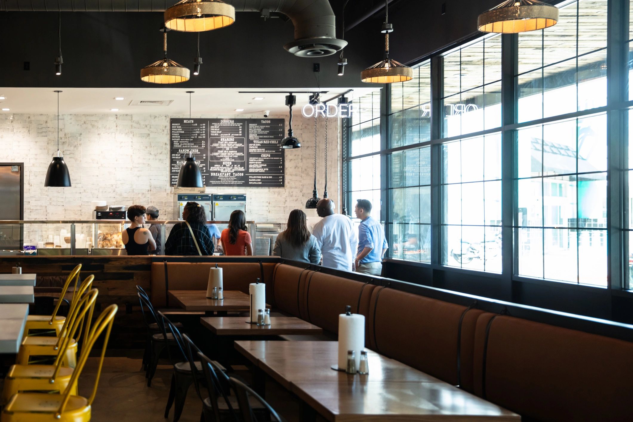 Busy casual restaurant interior with customers